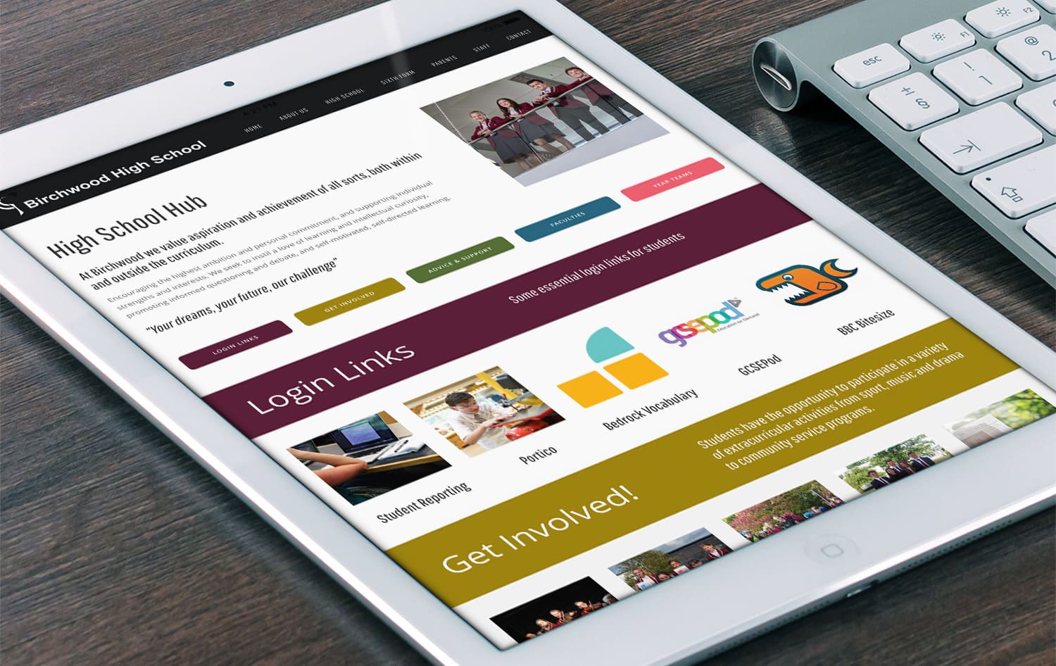 Tablet on a table displaying Birchwood High School responsive website