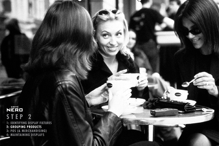 Black and white image of women drinking coffee together for Caff&egrave; Nero manual dividers