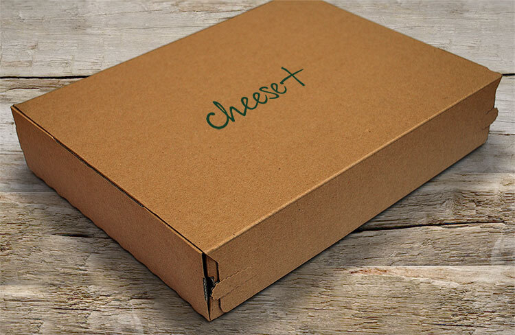 Closed box with Cheese Plus branding on top lid
