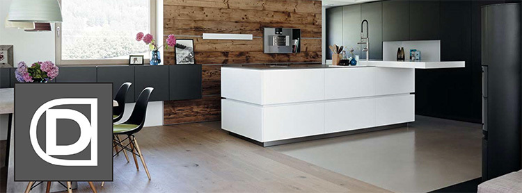 Kitchen with white center island and dining table with Domicile Design icon logo