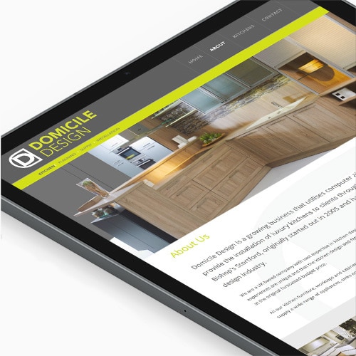 Tablet showing homepage of Domicile Design responsive website design Thumbnail