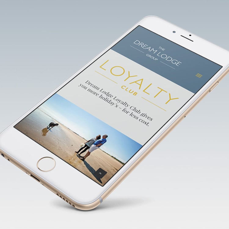 Mobile phone displaying Dream Lodge Loyalty responsive website design homepage