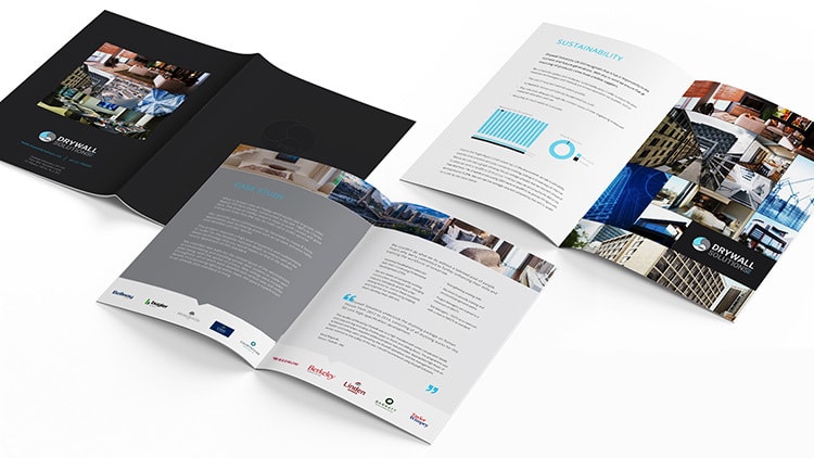 Opened Drywall Solutions black brochure showing the Front,back and spreads print design