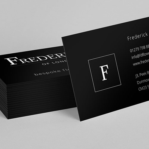 Business card resting on stack of business cards for Fredericks of London branding design Thumbnail