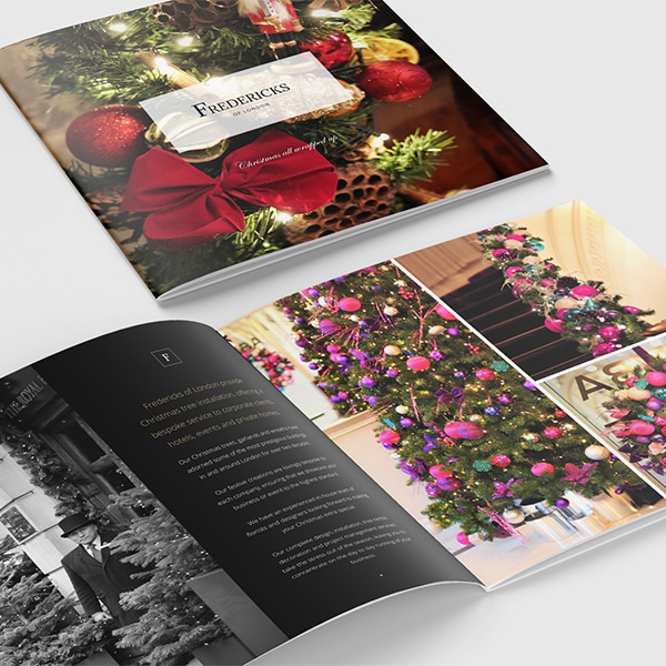 Christmas brochure print design with decorated Christmas tree front cover and spread for Fredericks of London