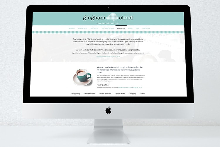 Desktop pc displaying the front page of Gingham Cloud website design