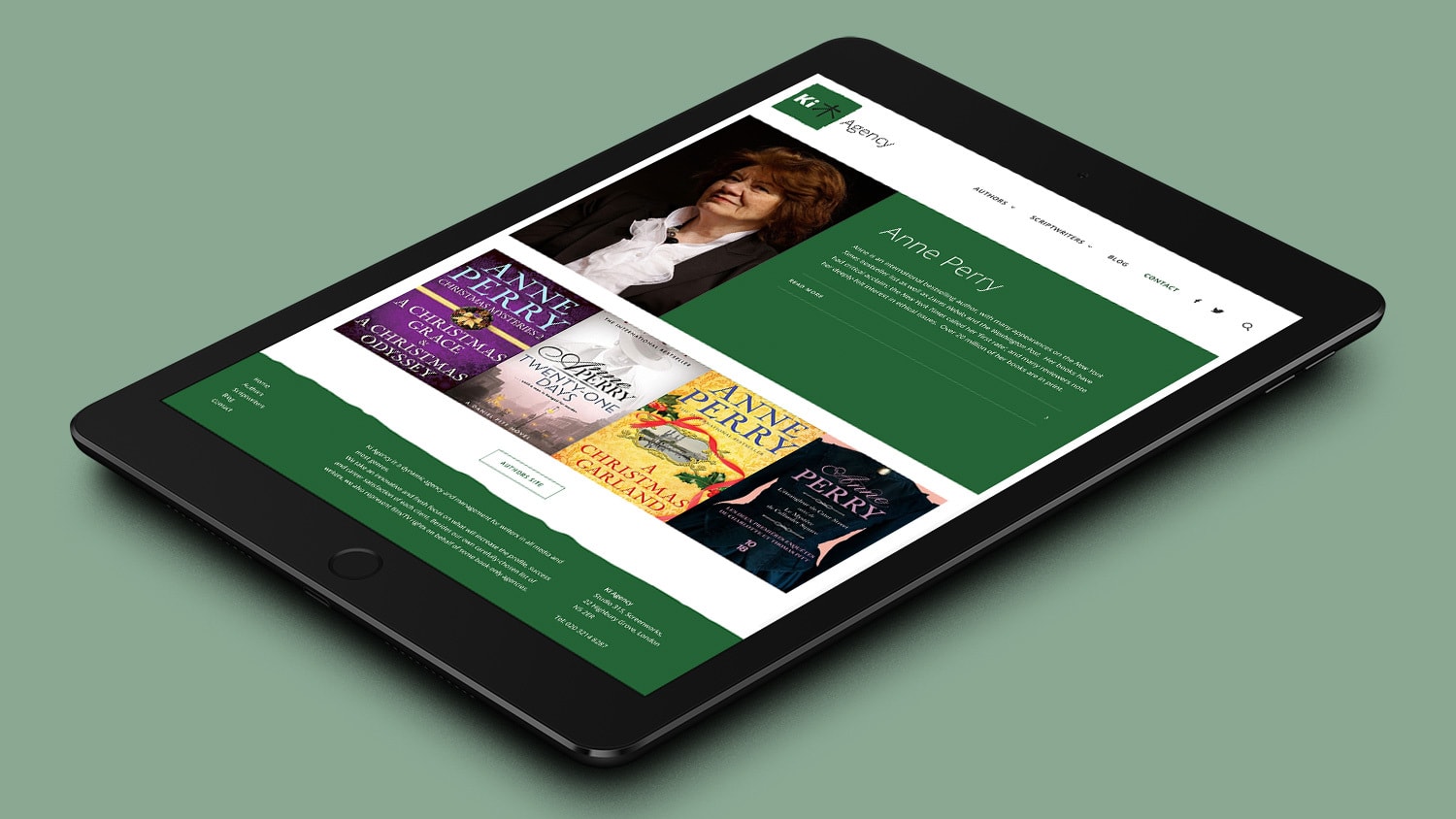 Tablet laying flat displaying home page of Ki Agency responsive website design