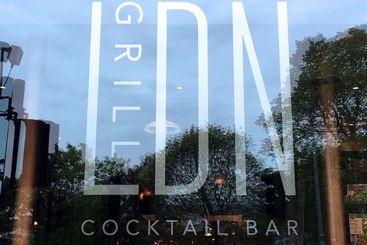 Window decal with LDN grill branding applied