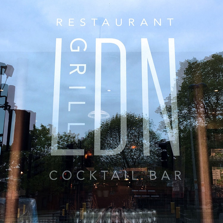 Window decal with LDN grill branding applied