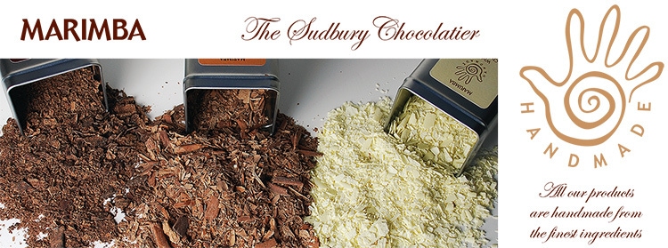 Marimba Exhibition banner promotion design showing Marimba chocolate shavings out of tins with Marimba label design