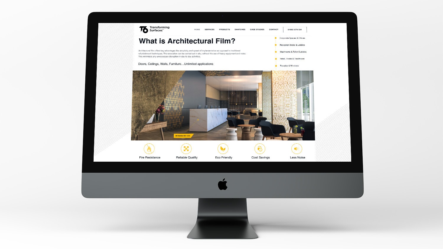 Desktop computer displaying the homepage of the new T6 website design