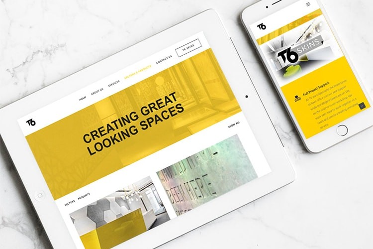 Tablet and mobile phone displaying the homepage of the new T6 website design