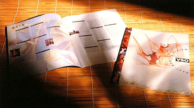 Sun gleaming on the front cover and open spread of VSO annual accounts brochure design