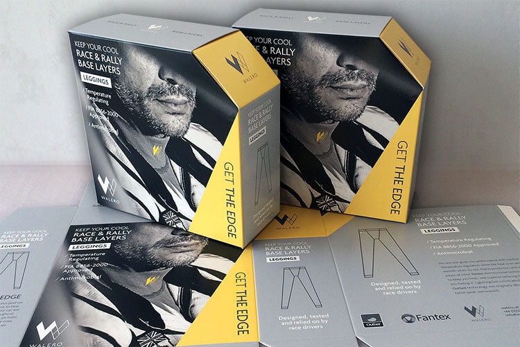 Close up of Walero box showing a full bleed resting above the packaging net cutout