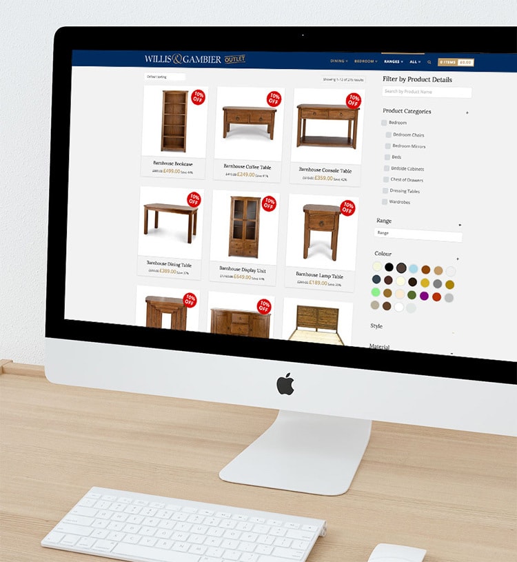 Desktop computer displaying shop page of the Willis & Gambier Outlet eCommerce website design