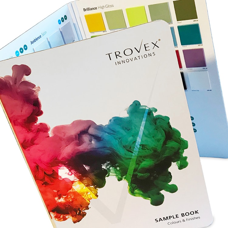 Close up of Trovex Innovations Sample Book with coloured ink splash on front